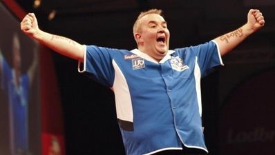 Phil Taylor makes nine-dart history