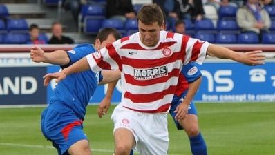 Wigan sign Scotland U-21 international