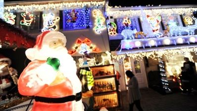 Picture: Woman uses Christmas lights to give her neighbours the finger