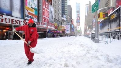 As we get heavy rain, America is buried under deep snow
