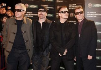 Bono reveals that U2 will be touring next year in smaller indoor venues
