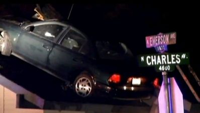 Video: Stolen car lands perfectly parked on the roof of a house