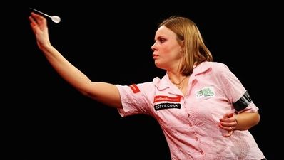 One reporter is really not happy about how the ladies darts is going