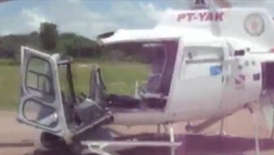 Video: Terrified locals watch as helicopter shakes to pieces