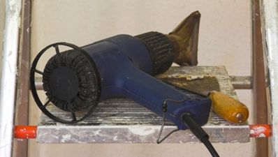 Removing paint with a heat gun