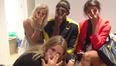 Usain Bolt celebrates his win with a group of stunning Swedes