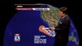 Weatherman stands in the wrong place at the wrong time