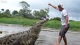 Video: Tour guide has a lucky escape from monstrous croc