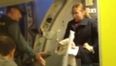 Video: Woman escorted off Ryanair flight by armed police