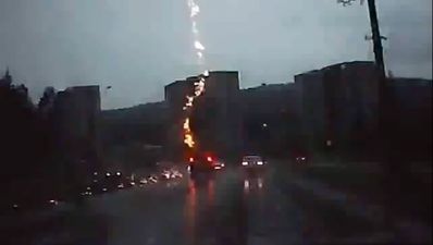Video: Lightning strikes SUV, driver doesn’t even notice