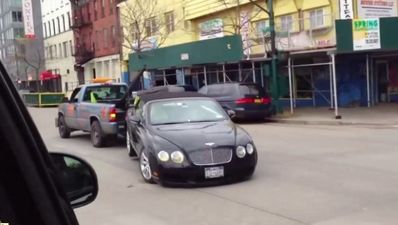 Video: Tow truck driver has no respect for Bentley Continental