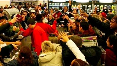 Video: Watch as men, women and children fight over cheap iPhones