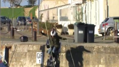 Video: Watch a French motoring journalist drive a bike off a pier