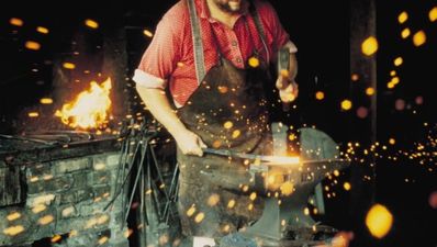 Video: This smoking blacksmith is the original ‘Overly Manly Man’