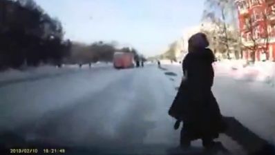 Video: Russian woman gets hit by car, but still catches her tram