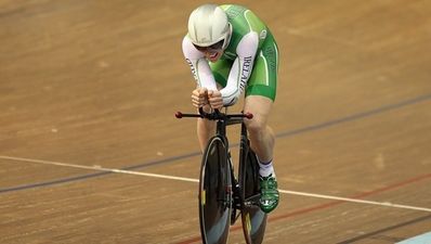 World champion Martyn Irvine shows off his medals