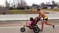 Dad with brain cancer wins marathon while pushing daughter in buggy