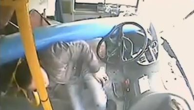 Video: Giant pole smashes through a bus in China hitting driver on the head
