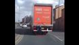 Video: Kid takes the express route home from school… on the back of a lorry