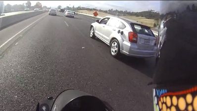 Video: Good guy biker helps out driver on the motorway