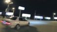Video: Midnight drifter nearly kills cameraman