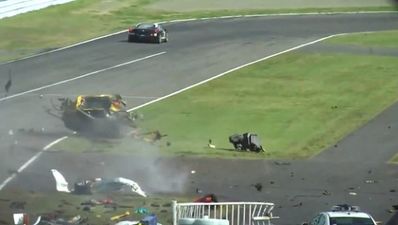 Video: Driver and race marshal lucky to survive horrific crash