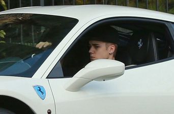 Video: Photographer takes a dive after being hit by Justin Bieber’s Ferrari