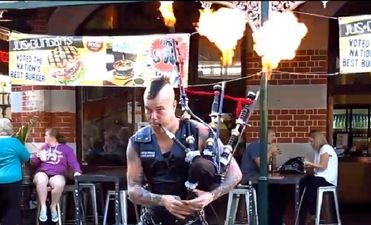 Australian busker performs AC/DC’s Thunderstruck on flaming bagpipes