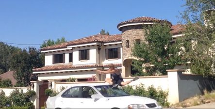 Video: Bloke tries to jump moving car… it doesn’t go as planned