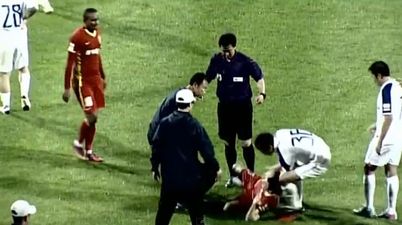 Video: Player sent off for dragging time-wasting opponent off the field