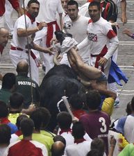 Pic: The Irish lad injured in the Pamplona bull run puts a brave face on it in hospital