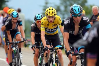 Video: Chris Froome gives a fan a belt for getting too close