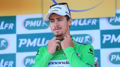 Video: Tour de France rider parks his bike on team car roof without getting off