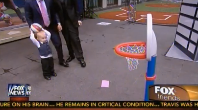 Video: FOX News reporter throws basketball at baby’s face… kind of