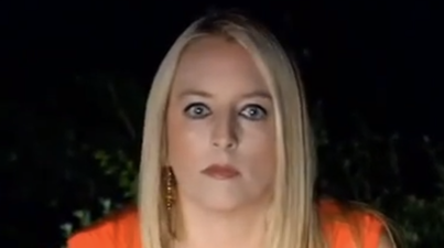 Video: News reporter gives a hilarious demonstration on how to ward off bears