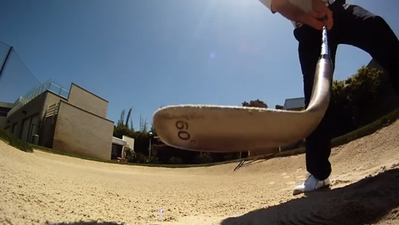 Video: Watch as a golfer chips a GoPro camera out of a sand bunker