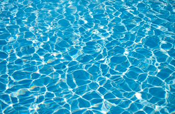 Pics: Irish lads build their own swimming pool using bales and plastic