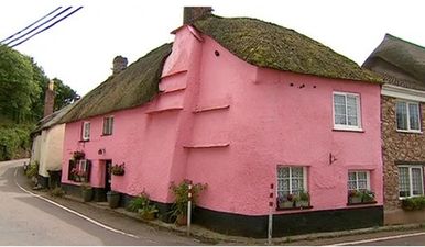 Tickle me pink – UK couple ordered to repaint house