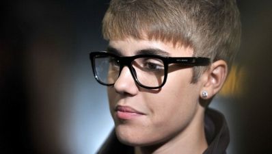 Pic: Emotionless Justin Bieber in snap with very happy lad in a Kerry jersey