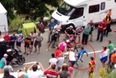 Video: Fan gets tripped while chasing cyclist in the Tour de France