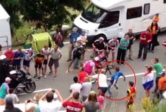 Video: Fan gets tripped while chasing cyclist in the Tour de France