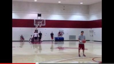 Video: Simply one hell of a basketball trick shot