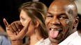 Pic: A far cry from The Hangover, Mike Tyson poses with newlyweds