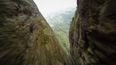 Video: American daredevil flies through 7-meter crack in Chinese mountain