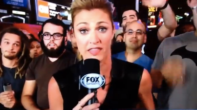 Video:  Epic photobomber uses the 1000-mile stare technique on Erin Andrews