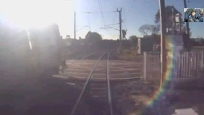 Video: Man’s amazing near-miss as he walks right in front of oncoming train