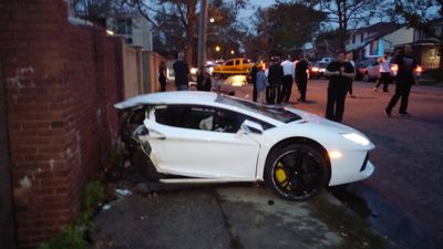 Lamborghini Aventador split in half following crash with mid-sized saloon