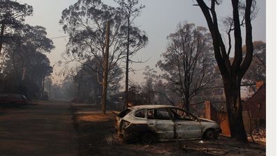 Pic: Incredible photo of Australian firefighters sleeping beside flames due to exhaustion