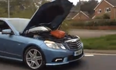 Video: Bloke drives his Mercedes with the bonnet up on a main dual carriageway