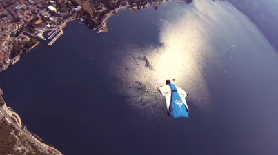 Video: Bloke lands safely after jumping off a mountain with no parachute